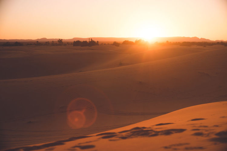 Scenic view of desert during sunset