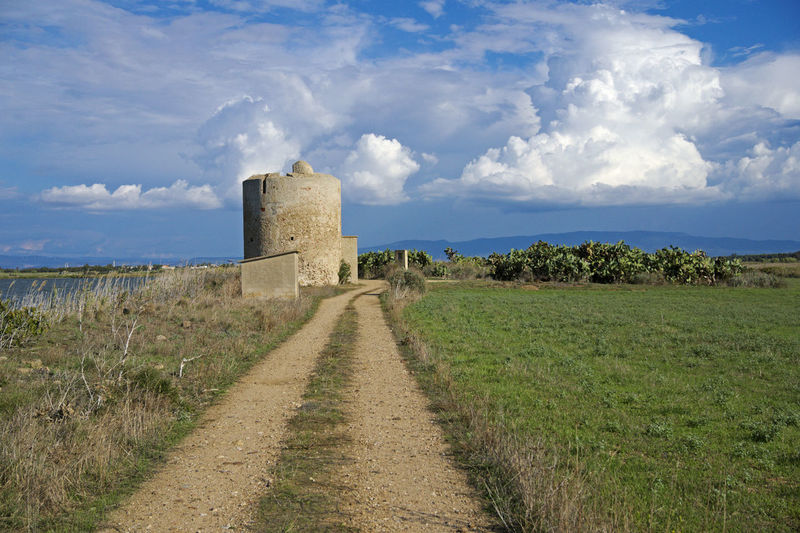 Panoramic view of castle on field against sky