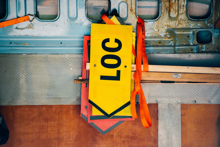 Close-up of road sign on machinery