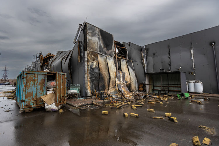 Outside the store, which was bombed, was looted by russian soldiers, occupiers.