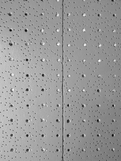 Full frame shot of raindrops on glass window