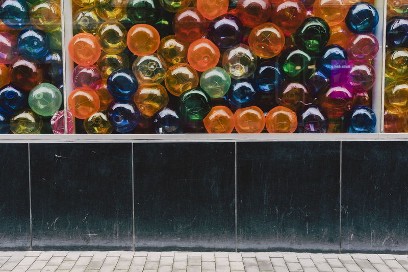 Multi colored balls in storewindow