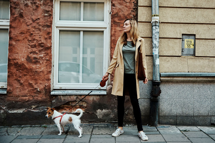 Woman walks with dog