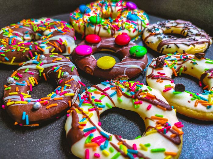 High angle view of multi colored candies on table