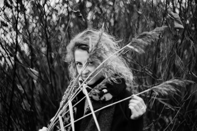 Portrait of young woman in forest