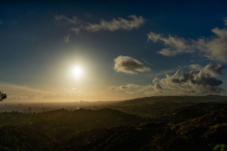 Scenic view of landscape against sky during sunset