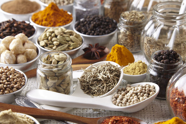 Close-up of various spices on burlap