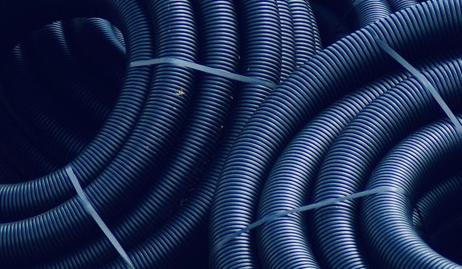 Full frame shot of black pipes 