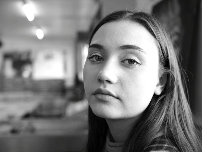 Close-up portrait of young woman