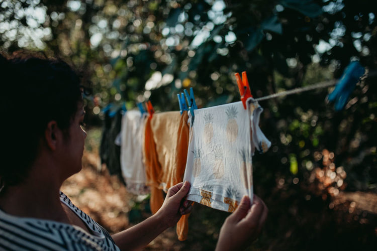 Woman drying clothes