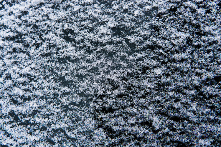 Full frame shot of snow covered rock