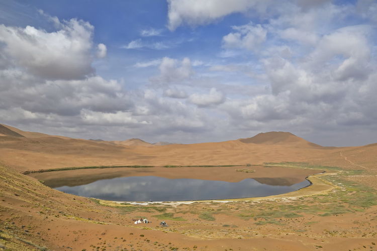 1079 lake zhalate-badain jaran desert-nomadic yurts-dune and sky reflection. inner mongolia-china.