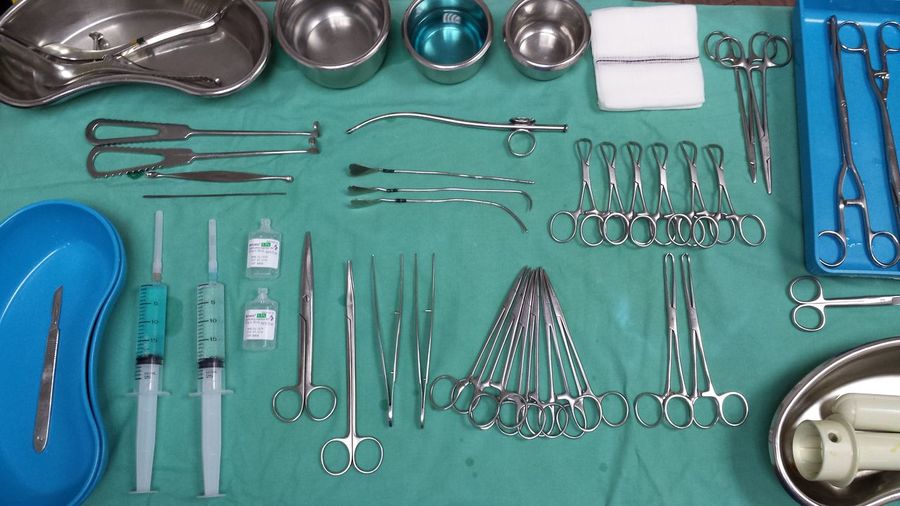 High angle view of surgical tools on table