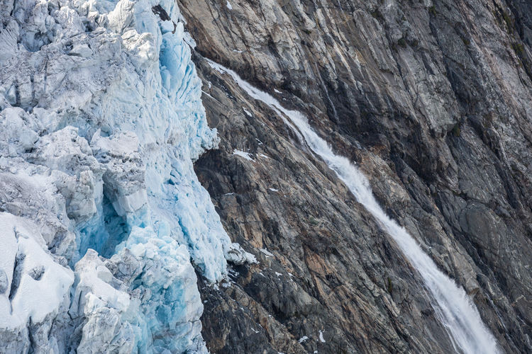 Close-up of ice on rocky mountain