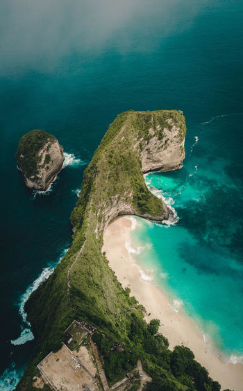 Aerial view of mountain at sea