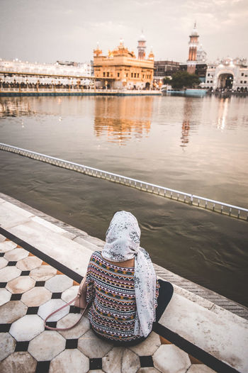 View of golden temple from a girl