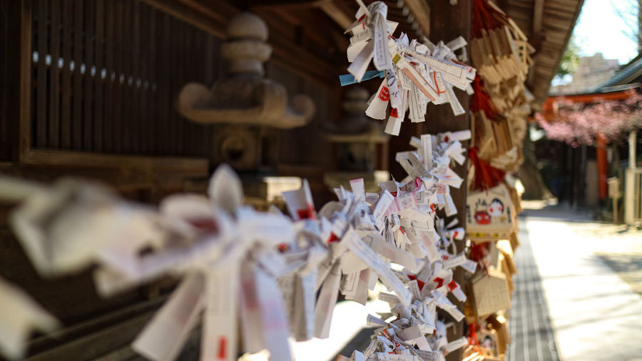 Clothes hanging on clothesline at market stall