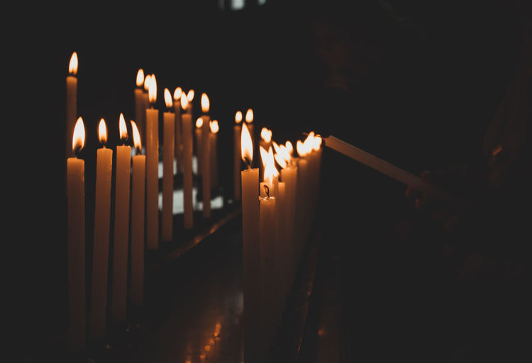 Lit candles in church