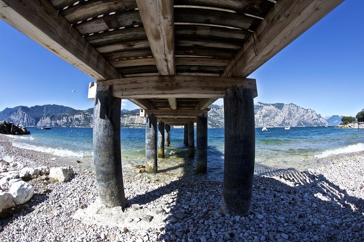 View of pier over sea against sky