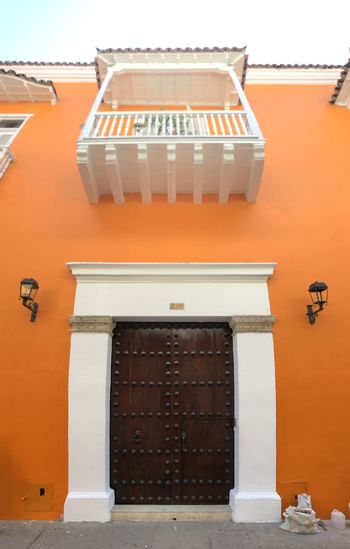 Exterior of house against orange sky