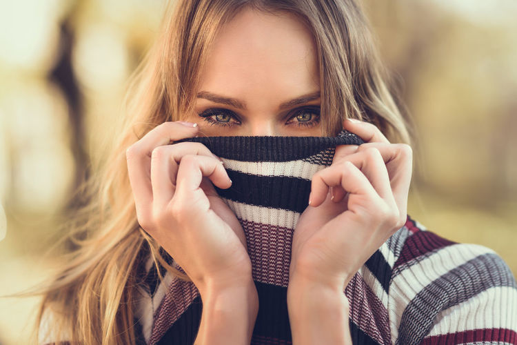 Close-up portrait of woman at park