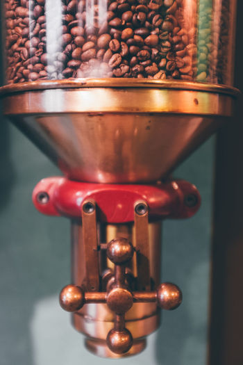 Roasted coffee beans in grinder
