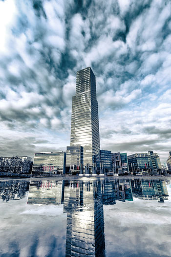 Low angle view of skyscrapers against sky