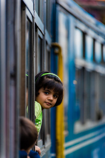 Close-up of girl in train