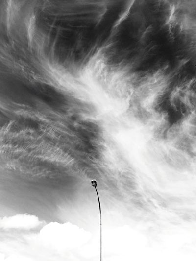 Low angle view of street light against sky