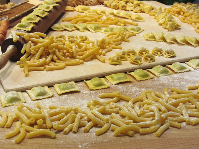 Raw pastas on table at home
