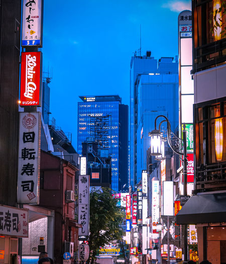 Illuminated city buildings at night