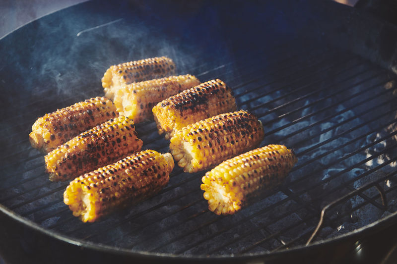 High angle view of corn on the cob on barbecue grill