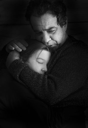 Father and daughter embracing