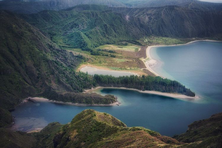 High angle view of river amidst mountains