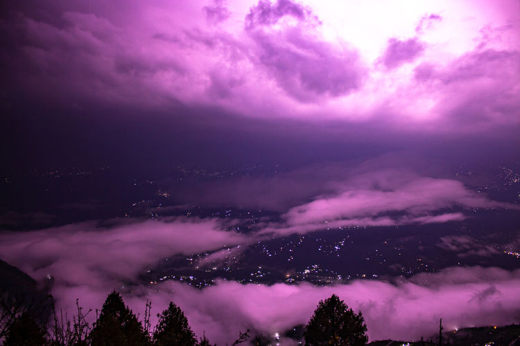 Low angle view of purple sky at night
