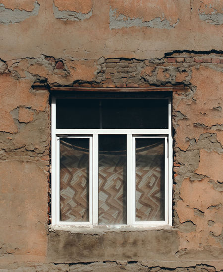 Closed window of old house