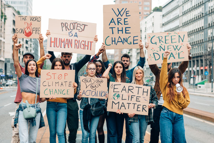 Fridays for future protest on city street - young activists movement against global warming