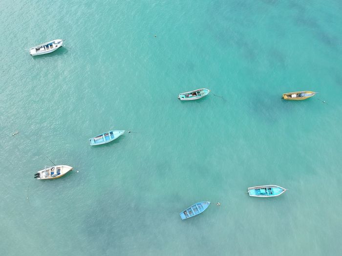 High angle view of boats sailing in sea