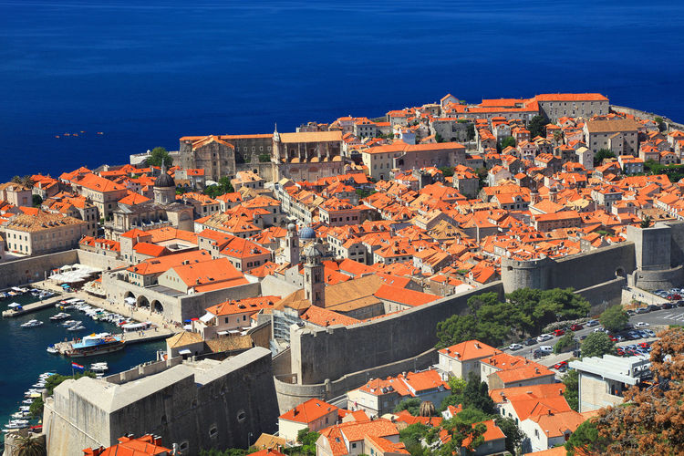High angle view of dubrovnik by sea against clear sky