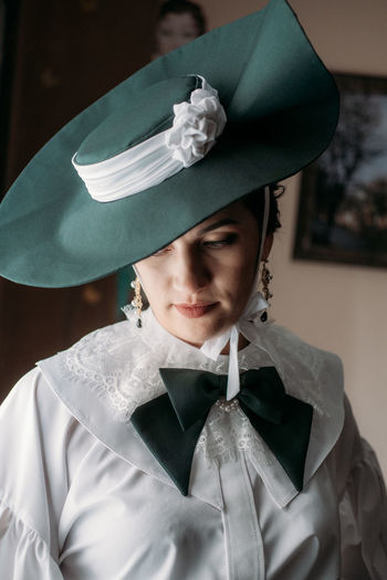 Rear view of woman wearing hat