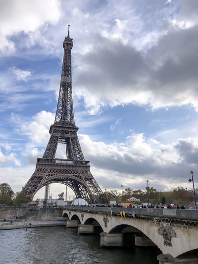 Eiffel tower at blue cloudy sky, paris, france