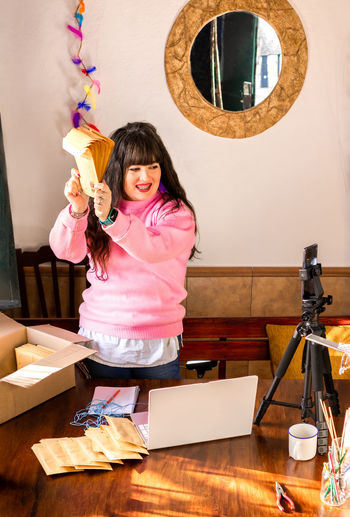 Portrait of cute girl playing with toys on table
