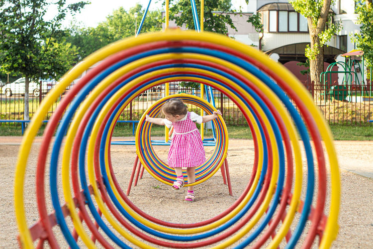 Low angle view of girl playing in park