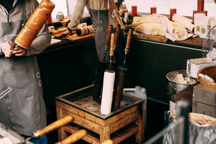 Midsection of chef making street food