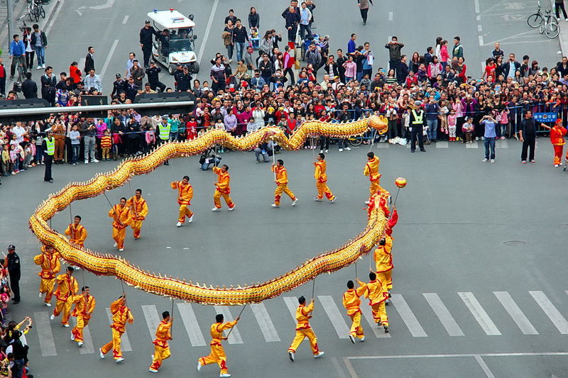 High angle view of chinese new year parade on street in city