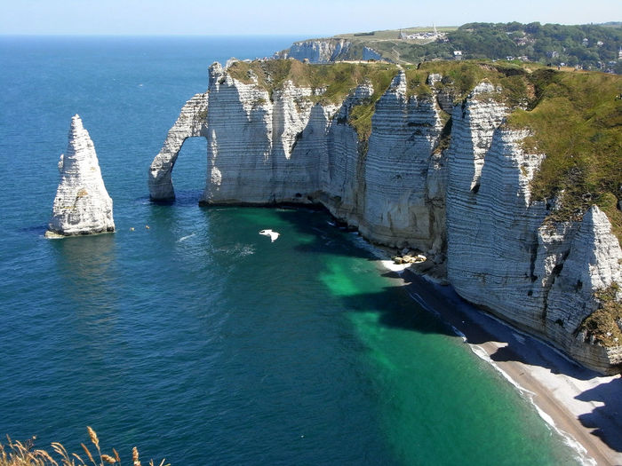 Cliff by sea at etretat