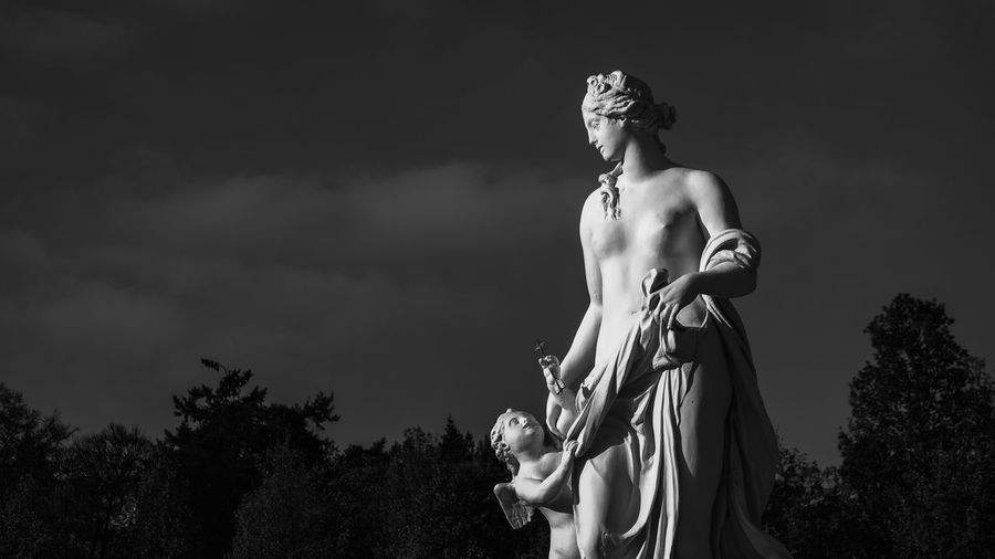 Low angle view of statue against sky
