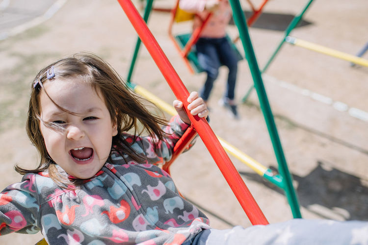 High angle view of girl playing on playground