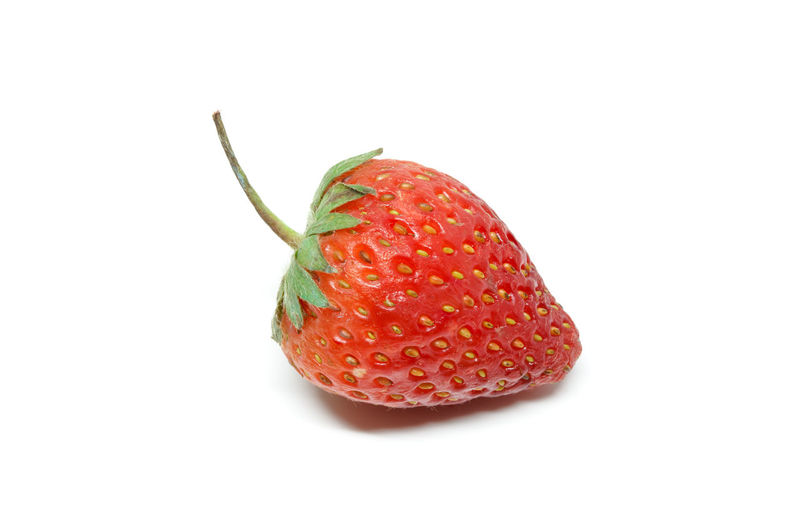 Close-up of strawberry against white background