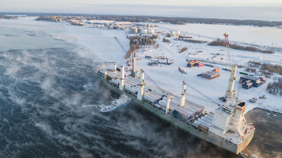 Aerial view of ship in harbor in winter